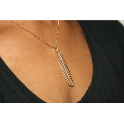 solid gold and diamond feather pendant